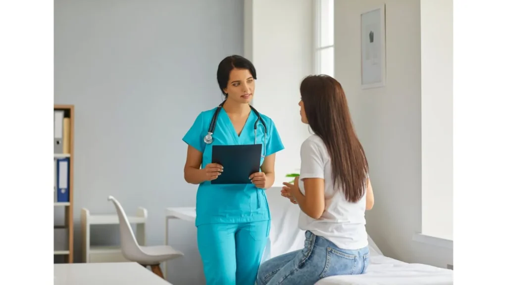 A Nurse Talking to a Patient