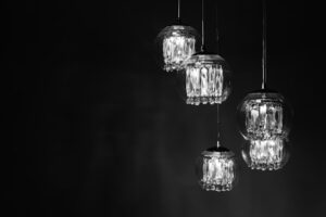Crystal pendant lights on a dark background