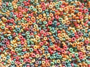Colorful fruit cereal loops filling the frame