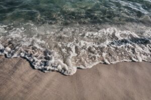 Waves washing onto a sandy beach