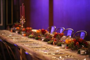Autumn-themed dinner table with candles