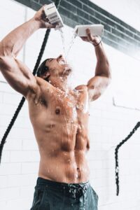 Man Splashing Water During Workout