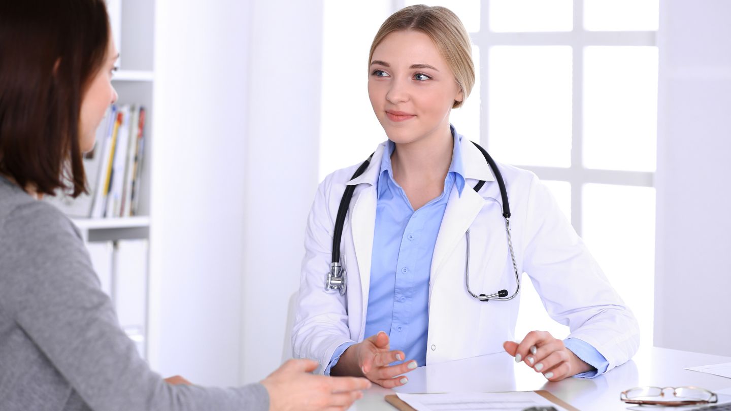 Doctor Consulting Patient During Appointment