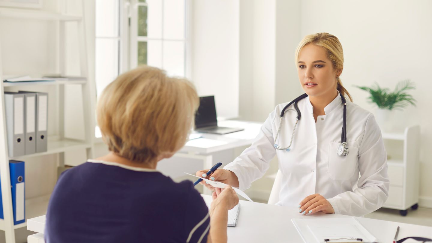 Doctor Consulting Senior Patient